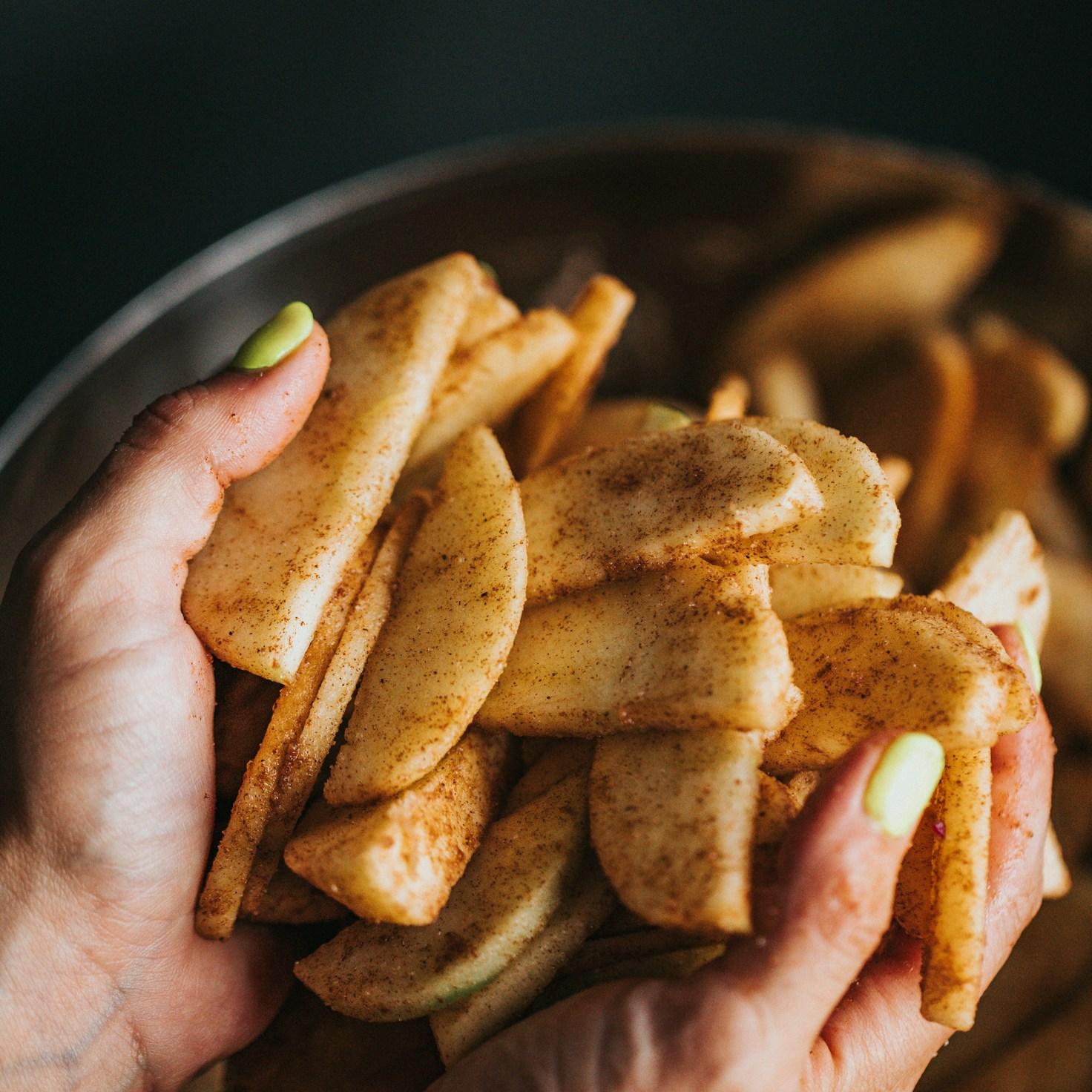 Diverse group of community members sharing a meal together, showcasing the social bonds formed through collaborative cooking